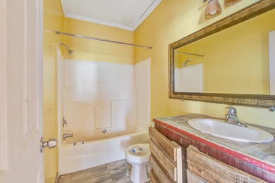 Three-bedroom, two-bath home situated on approximately 0.5 acres - photo 20