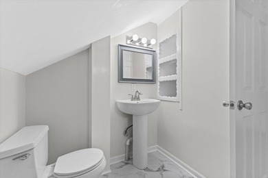 Welcome home to this beautiful Lake Geneva bungalow! Because the - photo 24