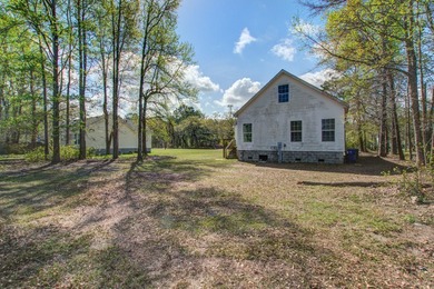 Three-bedroom, two-bath home situated on approximately 0.5 acres - photo 38