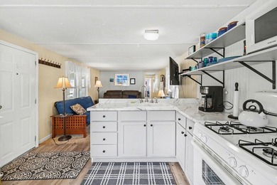 Welcome to easy, low-maintenance living in Tamarac Village! This - photo 11