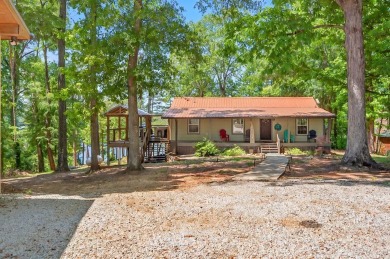 When you enter this 3 bedroom 2 bath lake home, you feel an - Lake Home For Sale in Fair Play, South Carolina