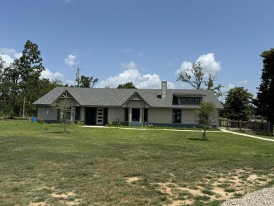 Lake Home For Sale in Powderly, Texas