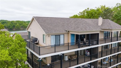 This top-floor 2BR/2BA unit offers privacy, thoughtful upgrades - photo 1