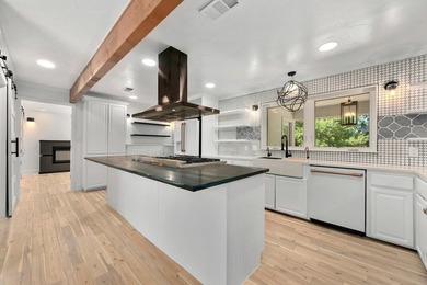 Masterfully reimagined as a private waterfront compound, this - photo 11