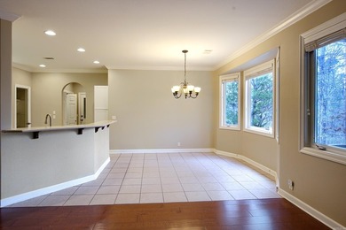 Desirable and beautifully maintained one-level townhome in