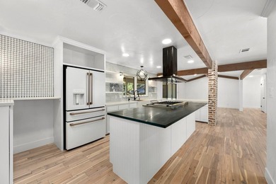 Masterfully reimagined as a private waterfront compound, this - photo 13