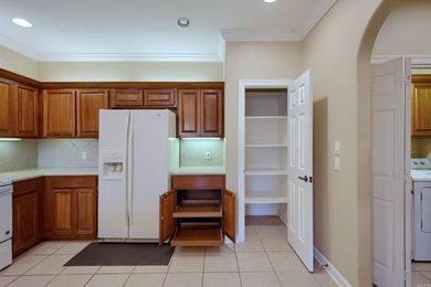 Desirable and beautifully maintained one-level townhome in