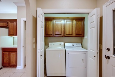 Desirable and beautifully maintained one-level townhome in