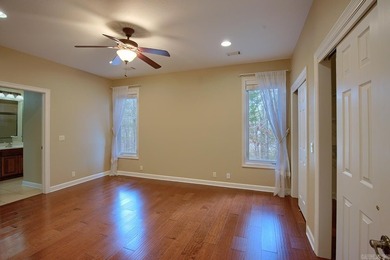 Desirable and beautifully maintained one-level townhome in