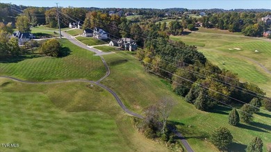 Enjoy over 2.94 acres overlooking the challenging 9th hole of