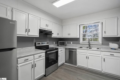 UPDATED, VACANT, MOVE IN READY. Discover an exceptional - photo 10