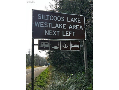 Nice 6+ acre building site on Northside of Siltcoos Lake with - photo 22