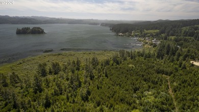Nice 6+ acre building site on Northside of Siltcoos Lake with - photo 33