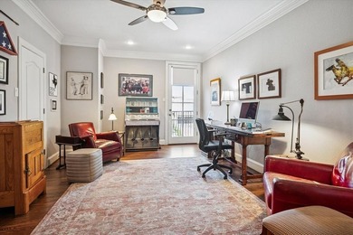 Welcome to refined, lock-and-leave luxury in this stunning