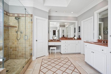 Welcome to refined, lock-and-leave luxury in this stunning