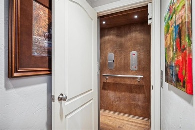 Welcome to refined, lock-and-leave luxury in this stunning