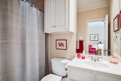 Welcome to refined, lock-and-leave luxury in this stunning