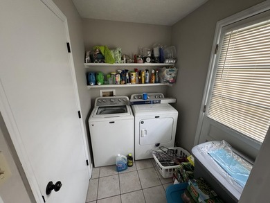 Check out this nicely updated 3 bedroom, 2 bath brick home - photo 22