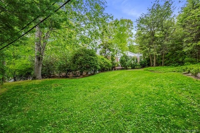 Welcome to this stately and timeless brick Center Hall Colonial - photo 34