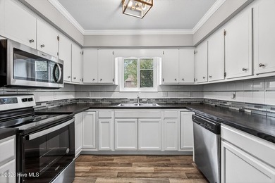 Welcome to 97 Quarterdeck, a charming, well maintained townhome - photo 8
