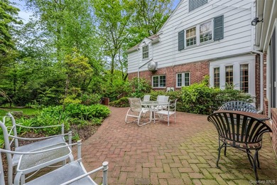 Welcome to this stately and timeless brick Center Hall Colonial - photo 38
