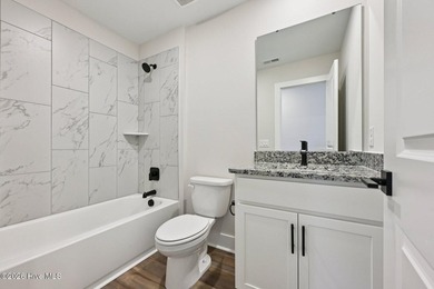 AVAILABLE NOW! This charming three-bedroom - photo 7