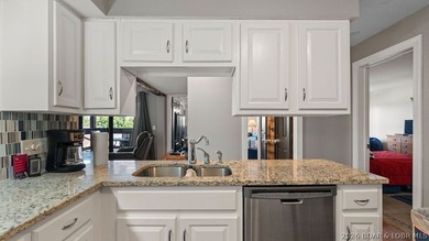 Turnkey Lakefront Living with a Dock Slip Included! Discover - photo 2