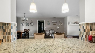 Turnkey Lakefront Living with a Dock Slip Included! Discover - photo 5