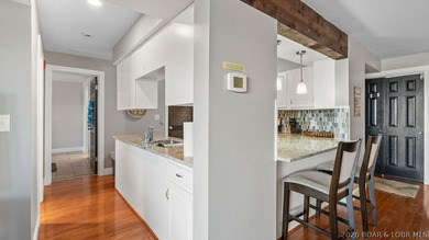 Turnkey Lakefront Living with a Dock Slip Included! Discover - photo 9