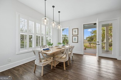 Beautiful marsh front coastal-style home surrounded by - photo 7