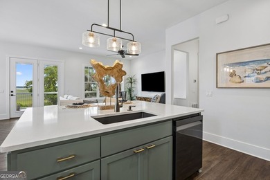 Beautiful marsh front coastal-style home surrounded by - photo 9