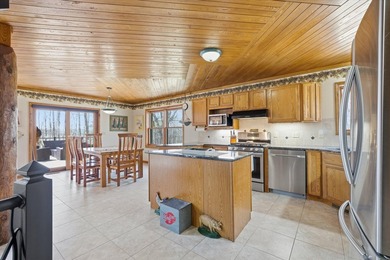 One-of-a-kind custom half log sided home on 24.5 wooded acres - photo 12