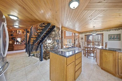 One-of-a-kind custom half log sided home on 24.5 wooded acres - photo 13
