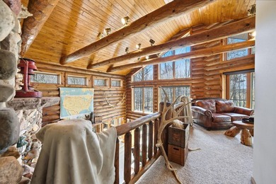 One-of-a-kind custom half log sided home on 24.5 wooded acres - photo 21