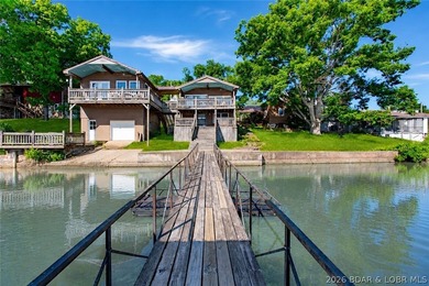 Originally a Quonset hut, this unique lakefront property blends - photo 2