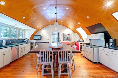 Originally a Quonset hut, this unique lakefront property blends - photo 6