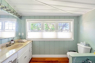 Originally a Quonset hut, this unique lakefront property blends - photo 10