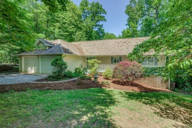 Waterfront home on beautifully laying lot with private wooded - Lake Home Sale Pending in Huddleston, Virginia