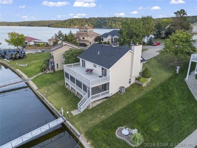 Rare lakefront gem offering a prime location by land and water - photo 1
