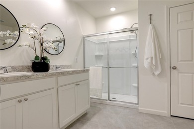 This exquisite 4-bedroom model in highly sought-after gated - photo 12
