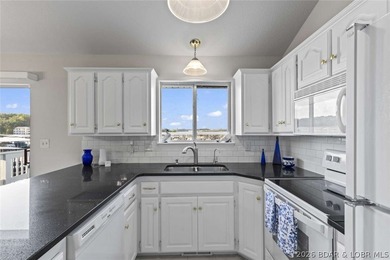 Rare lakefront gem offering a prime location by land and water - photo 6