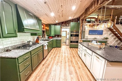 This log cabin dates back to the 1890, is beautiful remodeled - photo 3