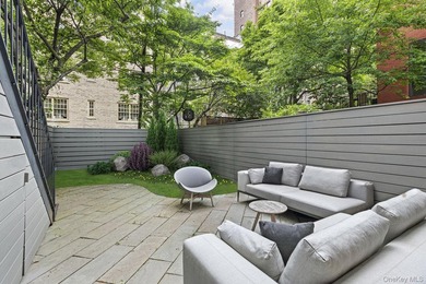 A renovated two-family townhouse nestled less than two blocks - photo 11