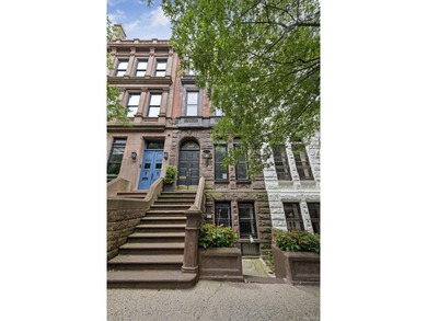 A renovated two-family townhouse nestled less than two blocks - photo 13