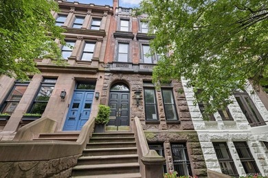 A renovated two-family townhouse nestled less than two blocks - photo 14