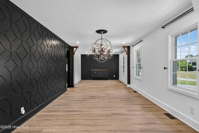 Completely reimagined and beautifully renovated, this stunning - photo 8
