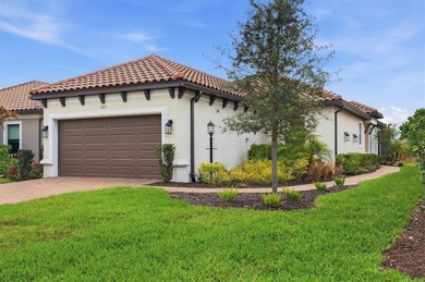 Welcome to resort-style living in the highly sought-after - photo 1
