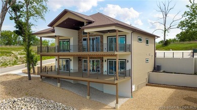5499 Deephaven Lane in Osage Beach blends new construction with - photo 2