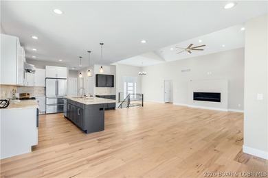 5499 Deephaven Lane in Osage Beach blends new construction with - photo 7