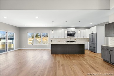 5499 Deephaven Lane in Osage Beach blends new construction with - photo 9
